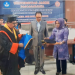 Kadisdik Provinsi Jambi, Dr. Varial Adhi Putra, ST., MM., telah dinyatakan lulus dengan Predikat Cumlaude, sehingga resmi menjadi Doktor Prodi Ilmu Kependidikan, Selasa (28/02/2023). (Foto: Wahyu)