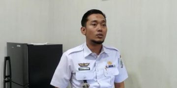 Kabag Hukum Pemerintah Kota Jambi, Gempa Awaljon saat ditemui di ruang kerjanya, Rabu (07/60/2023). (Dok. siklusjambi)