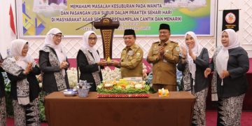 Pengukuhan Bidan Delima di Gedung Gedung Maulidia Convention Center (MCC) Pematang Sulur Kota Jambi, Senin (31/7/2023). (Foto: Diskominfo/Agus)