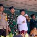 Edi Purwanto menghadiri Apel Hari Santri Nasional tahun 2023 di lapangan Wirotho Agung, Kecamatan Rimbo Bujang, Kabupaten Tebo, Minggu (22/10). (Dok. Humas)